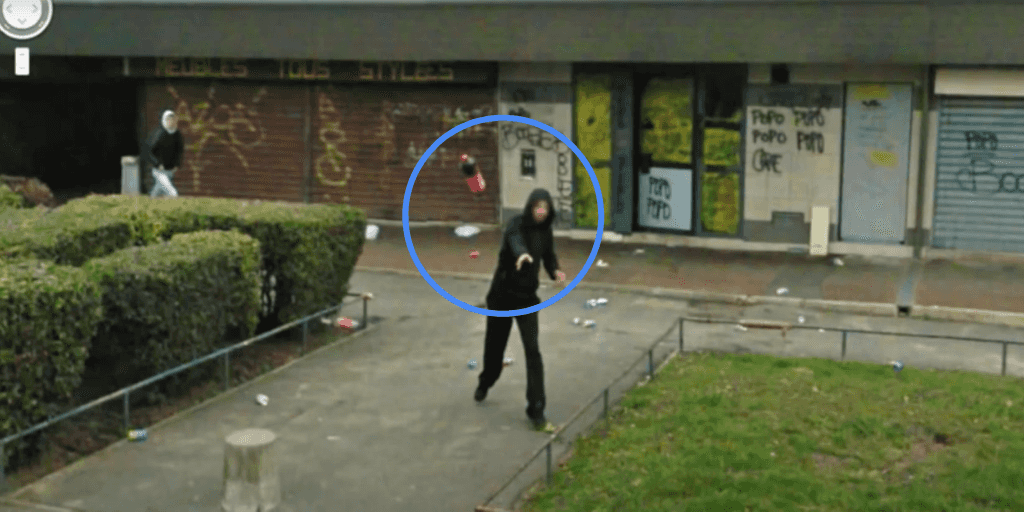 Figure 2: A citizen throws a coke bottle towards a mobile mapping vehicle as an act of protest against being captured on video/photo.